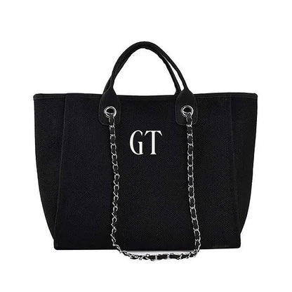 The Jade Canvas Initial Boujee Black Medium Bag